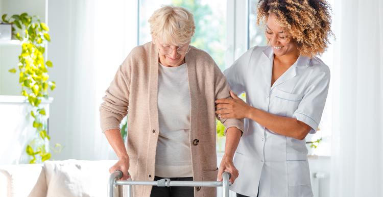 Women assisting women to walk