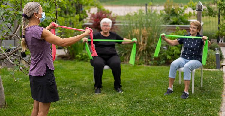 Outdoor-Exercise-Older-Group-Sitting