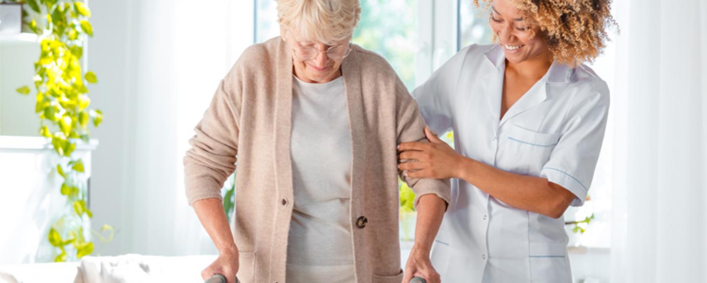 Women assisting women to walk