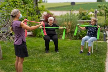 Outdoor-Exercise-Older-Group-Sitting