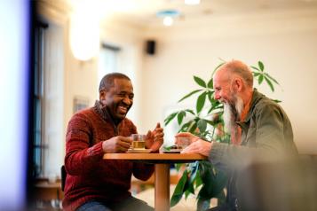 Two men laughing